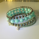 Labradorit, imit. Amazonit und Bicones